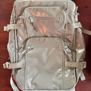 Calpak Terra 26 L Laptop Duffel Backpack in the color Juniper.